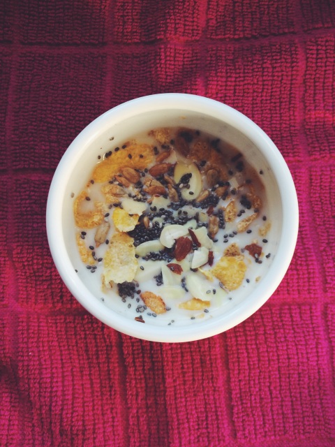 honey bunches of oats + chia seeds + sunflower seeds + sliced almonds + almond milk